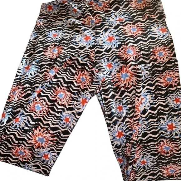 2pair TC lularoe Americana Leggings. One floral flags, one fireworks. VGUC - Picture 4 of 11